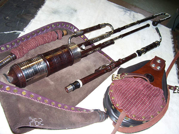 Half set in cocobolo, ebony, artificial ivory, nickel